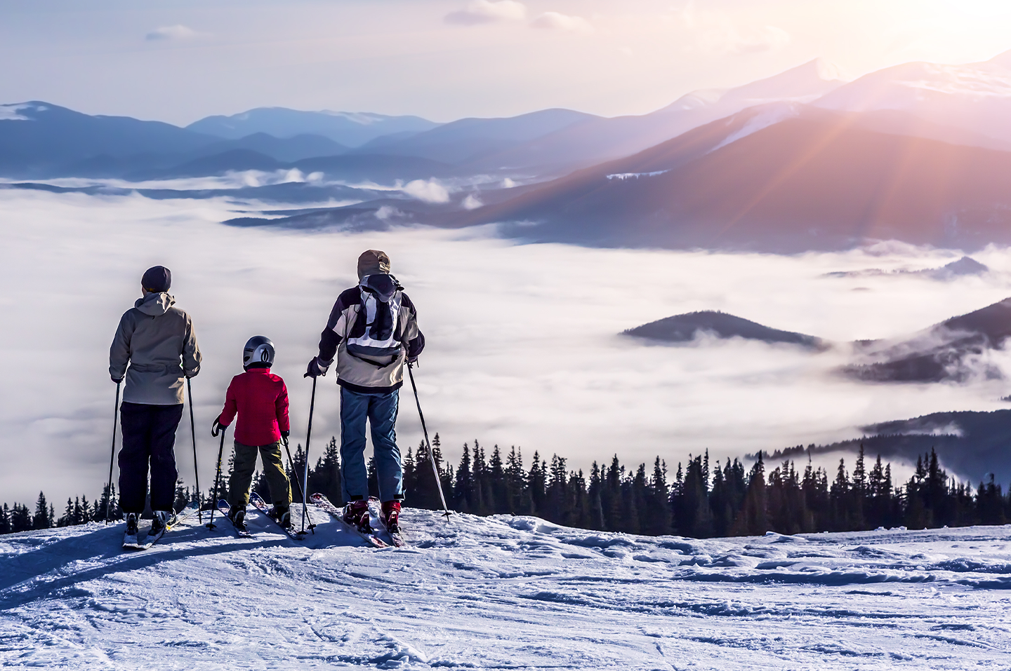 A family skiing in Vermont
