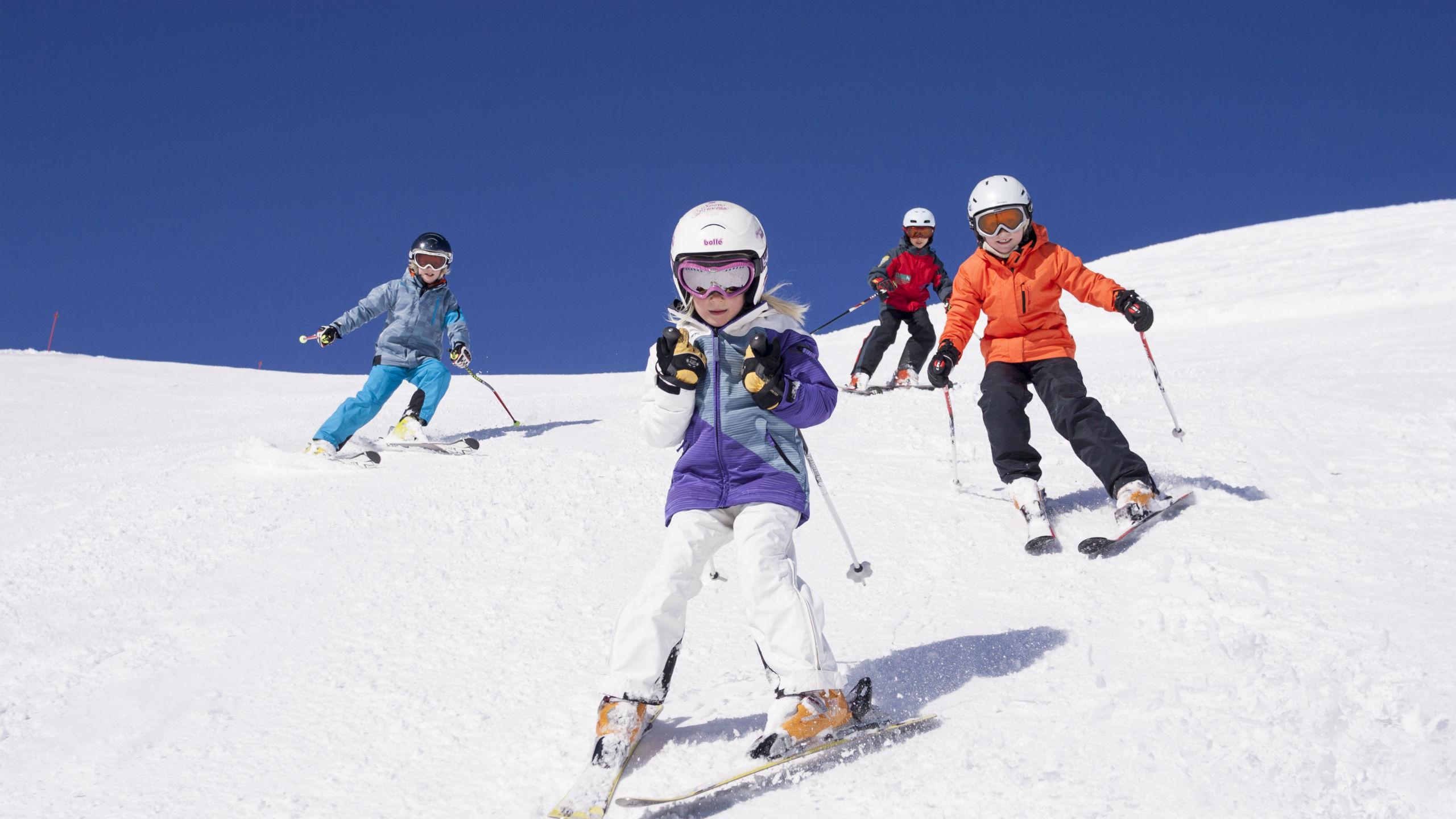 12 Top Tips for Skiing with Kids - The Family Vacation Guide
