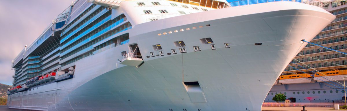 Luxury cruise ship docked in the port of Caribbean.