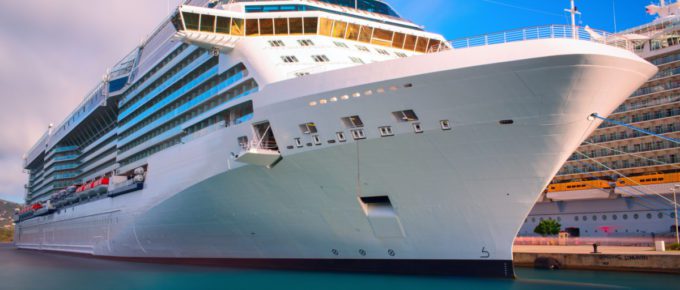Luxury cruise ship docked in the port of Caribbean.