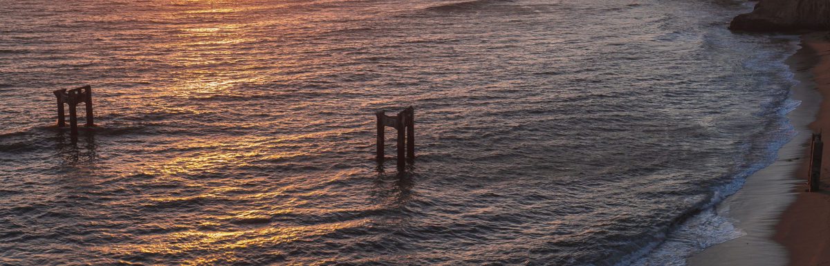 Beautiful and peaceful sunset overlooking the beach, in Long Beach, California.
