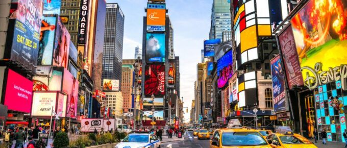 A busy tourist intersection of neon art and commerce and is an iconic street of New York City and America.