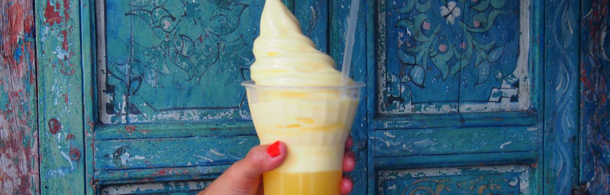 A woman hand holding Dole Whip at Walt Disney World, Orlando, Florida, USA