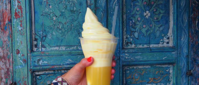 A woman hand holding Dole Whip at Walt Disney World, Orlando, Florida, USA