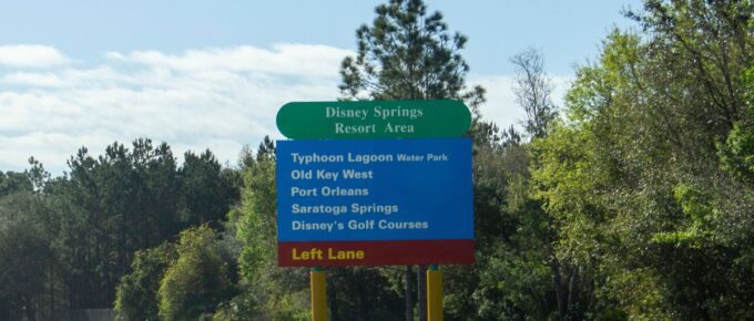 Sign marking the various resorts at the Disney Springs Resort Area inside DisneyWorld area in Orlando, Florida, USA.