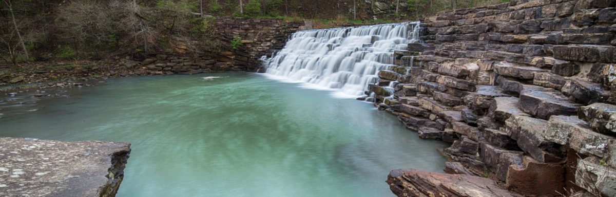 Lee Creek spills across Lee Creek Dam, at Devil's Den State Park, in Arkansas.
