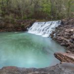 Lee Creek spills across Lee Creek Dam, at Devil's Den State Park, in Arkansas.