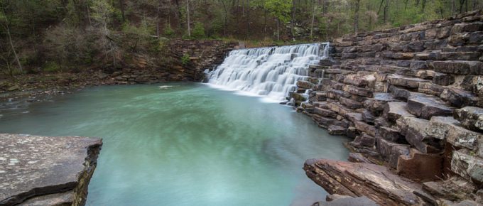 Lee Creek spills across Lee Creek Dam, at Devil's Den State Park, in Arkansas.