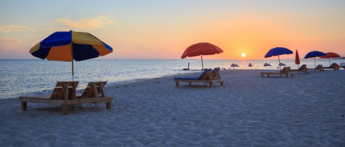 Sunset in Biloxi beach, Mississippi, along Gulf Coast shore.