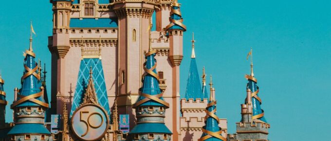 A castle surrounded with many people in Disney World, Orlando, Florida, USA.