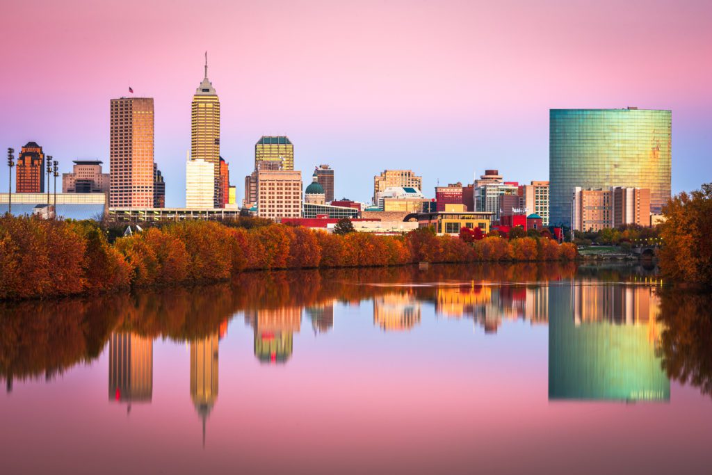 the Indianapolis skyline backing onto a pink sky