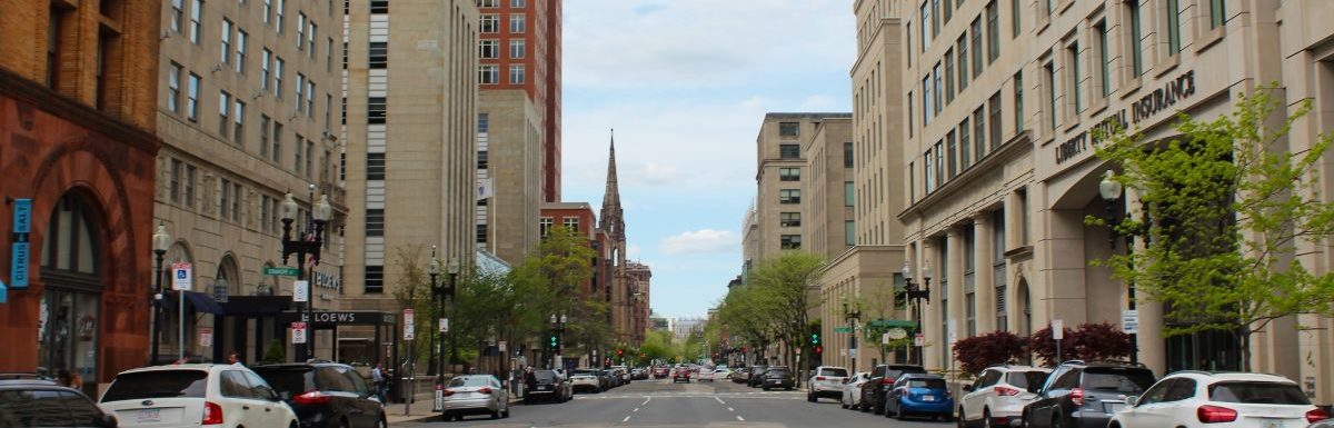 A street with cars on the side in Boston, Massachusetts, USA.