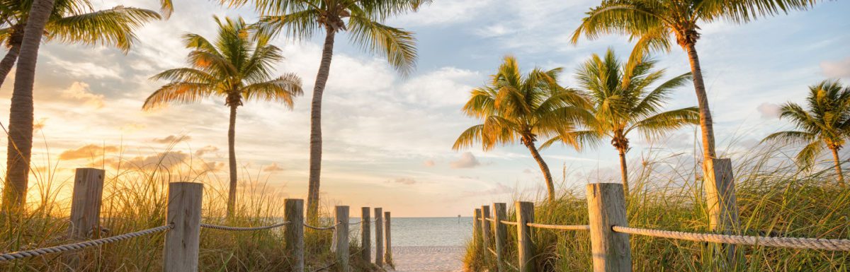Footbridge to the Smathers beach on sunrise Key West, Florida, USA.