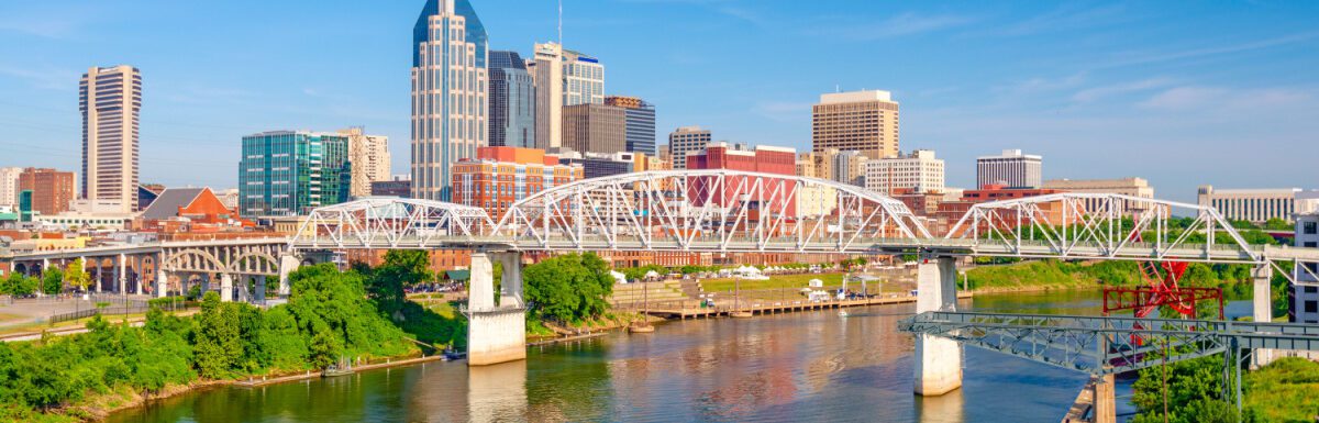 Nashville, Tennessee, USA downtown city skyline on the Cumberland River.