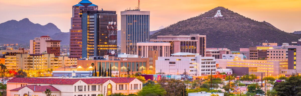 Tucson, Arizona, USA downtown skyline with Sentinel Peak at dusk.