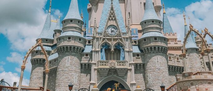 Mickey and Minnie Mouse in front of castle in Orlando, Florida, USA.