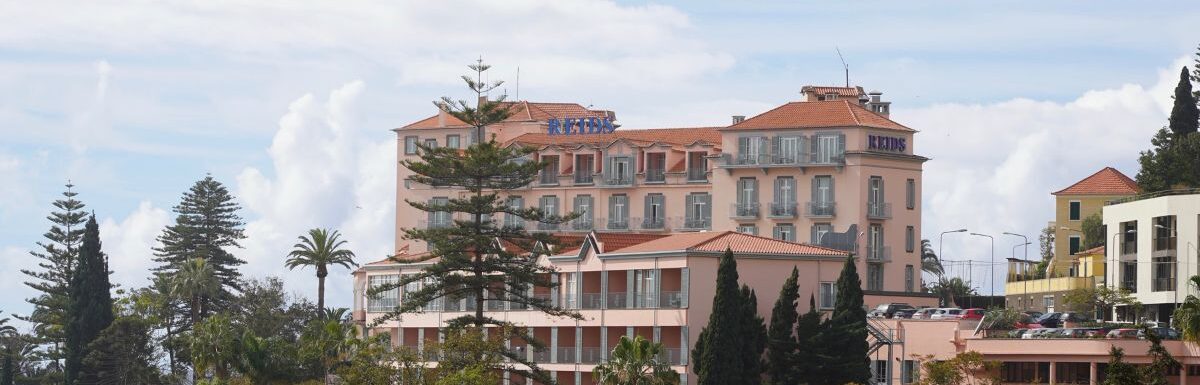 Panoramic view on the historic luxury hotel Reid's Palace in Funchal on Madeira Island, Portugal.