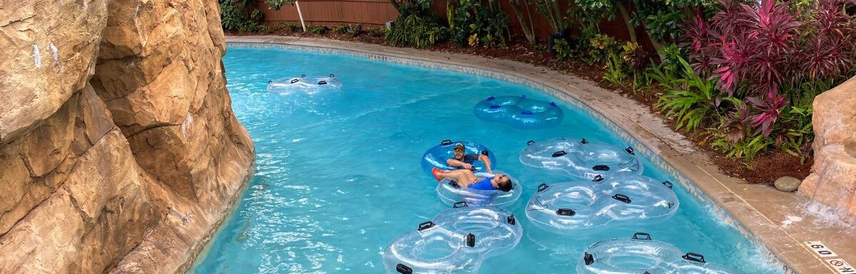 People floating down the lazy river during the day.
