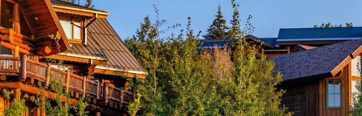 Cabins in a luxury neighbourhood at sunset.