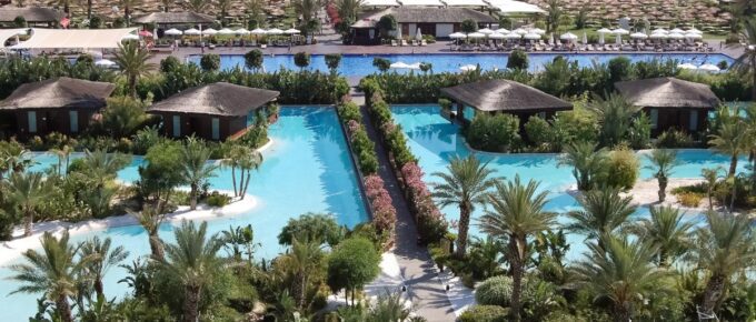 View of the beach line and territory with pools of the luxury hotel Maxx Royal Belek Golf Resort.