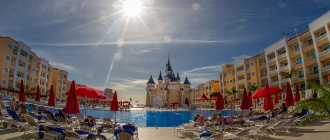 Resort with tourists in Fantasia Bahia Principe Tenerife during the day.