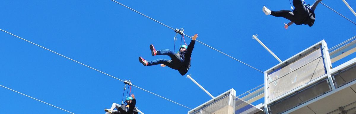 People using the Zipline attraction over the waterfalls, Niagara Falls, Ontario, Canada.
