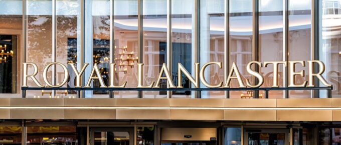 Closeup of sign entrance to the Royal Lancaster hotel with facade exterior modern building architecture in London, UK.